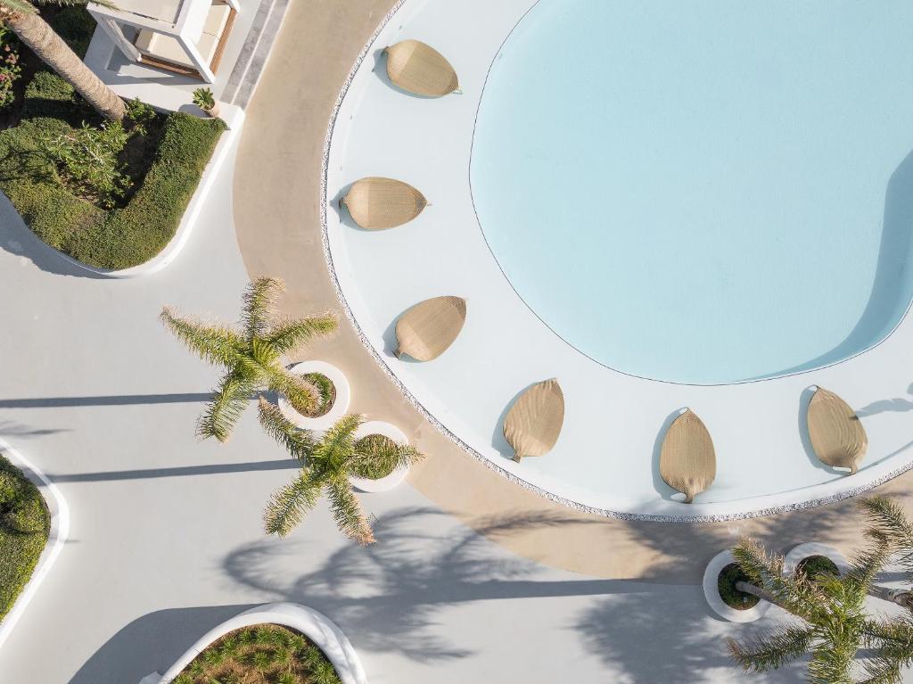 Bazén v ubytování Caramel, A Grecotel Resort to Live nebo v jeho okolí
