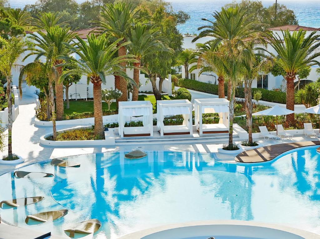 Bazén v ubytování Caramel, A Grecotel Resort to Live nebo v jeho okolí
