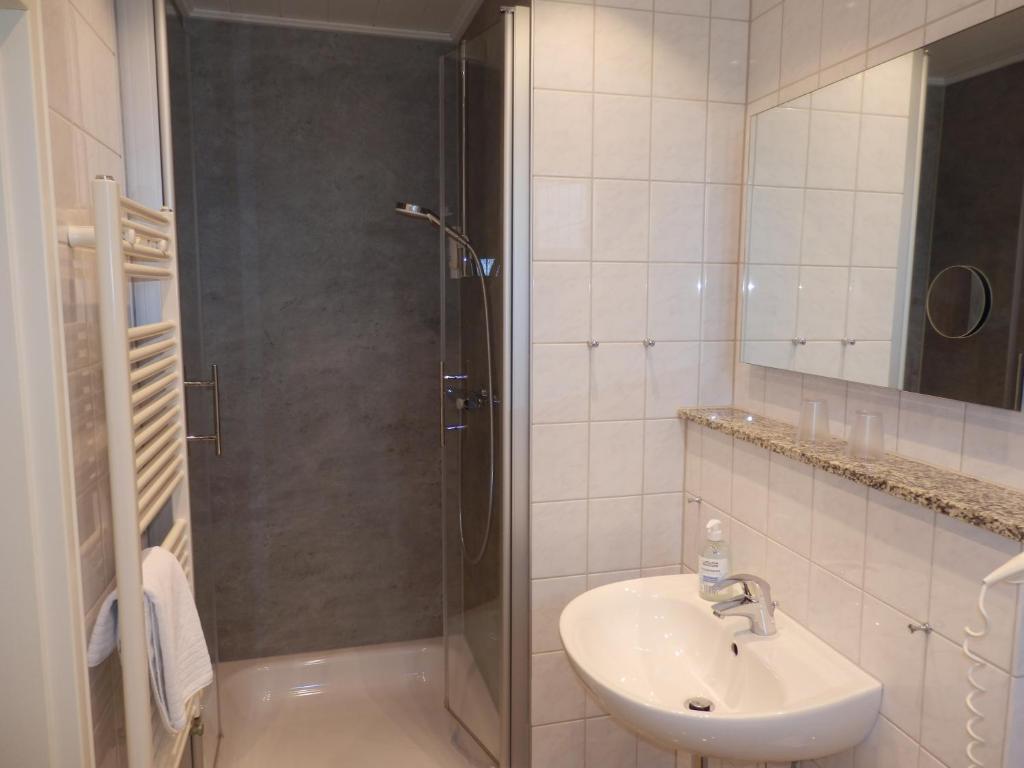 Koupelna v ubytování Hotel Bellevue