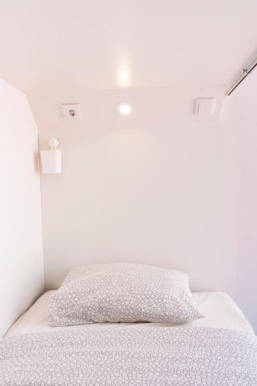 Postel nebo postele na pokoji v ubytování Arca Nova Hostel - Caminha
