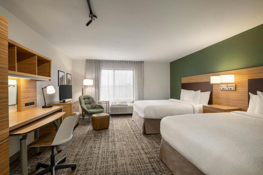 Postel nebo postele na pokoji v ubytování TownePlace Suites by Marriott Alexandria