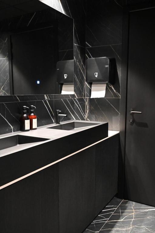 Kuchyň nebo kuchyňský kout v ubytování Bremberg Hotel