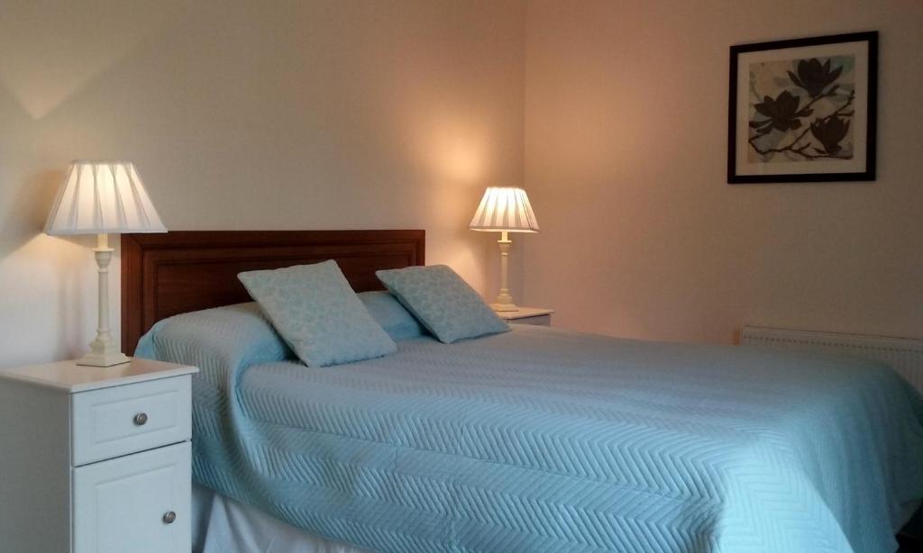 Postel nebo postele na pokoji v ubytování Ocean Lodge B&B