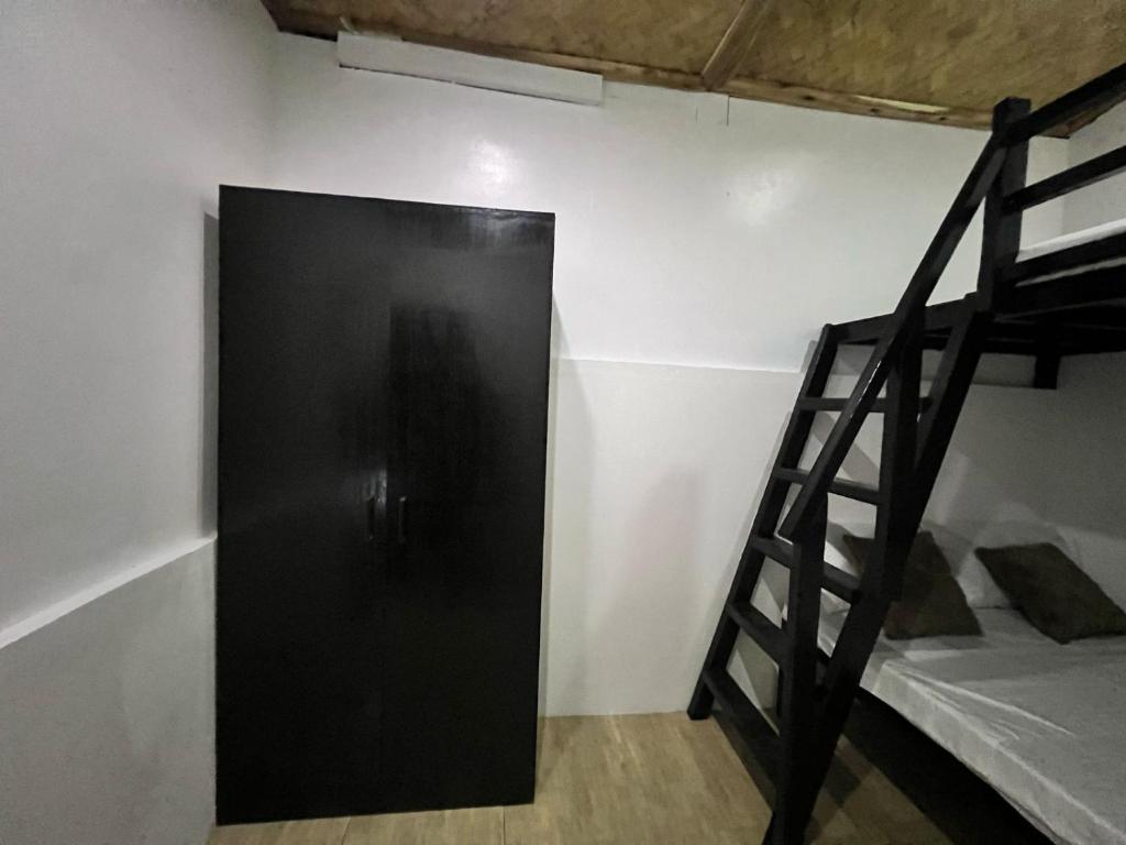 Μία ή περισσότερες κουκέτες σε δωμάτιο στο AA Hostel