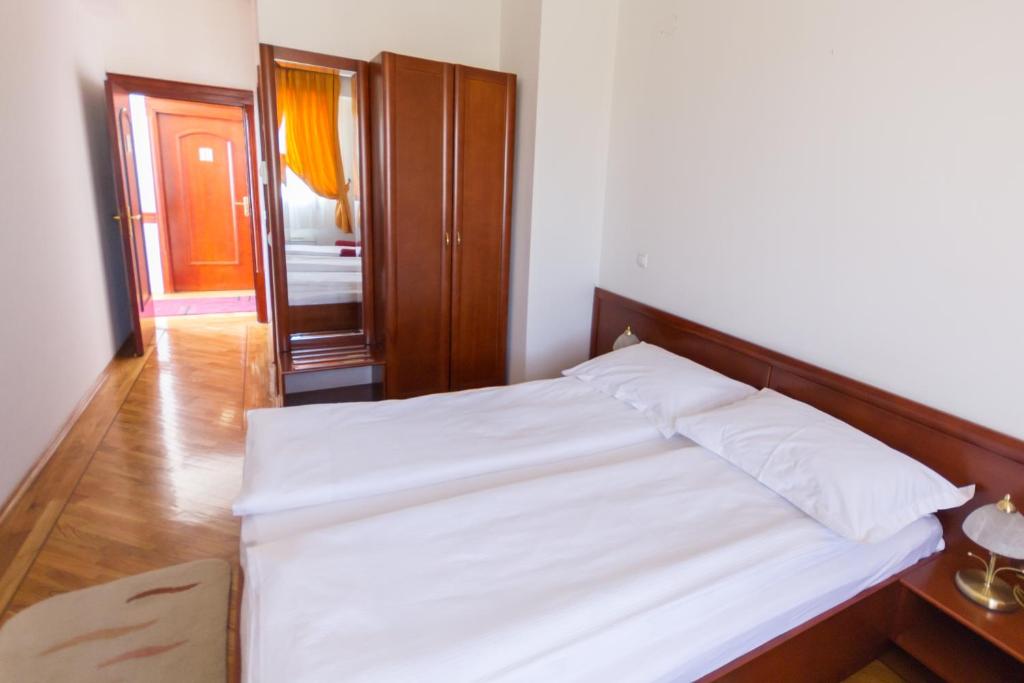 Postel nebo postele na pokoji v ubytování Hotel M3