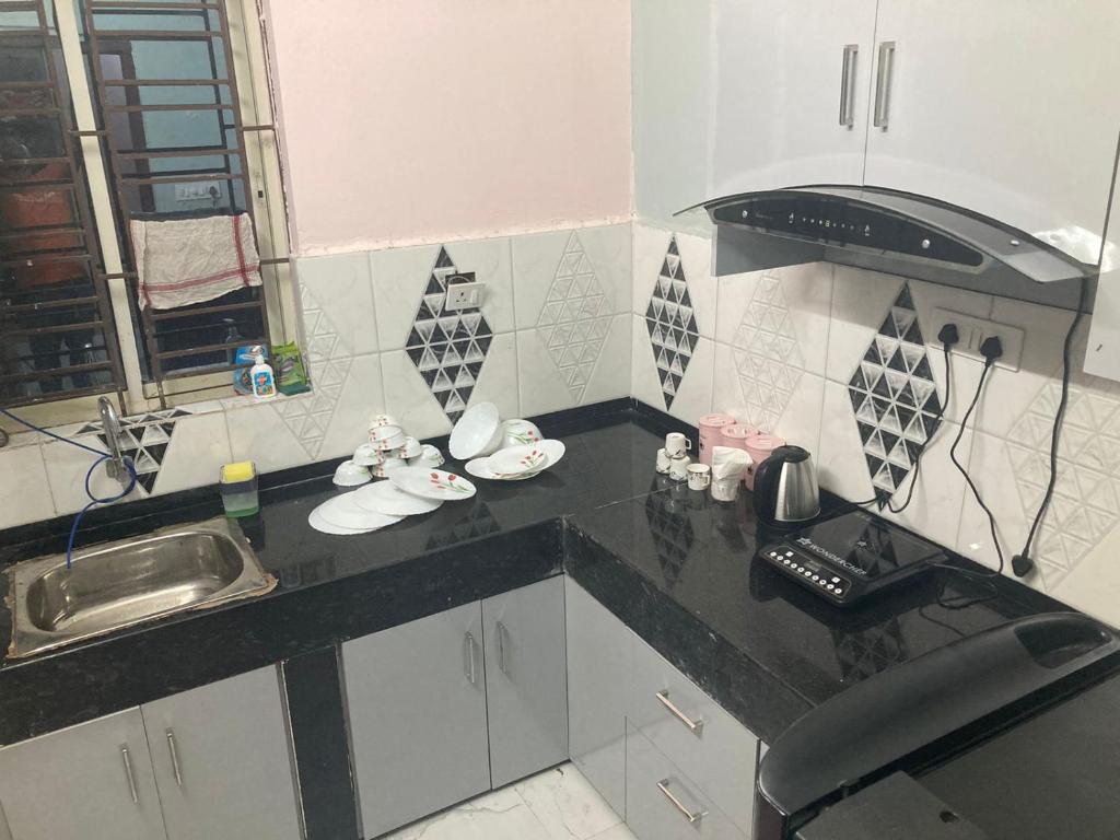 Kuchyň nebo kuchyňský kout v ubytování The Hood MOTEL