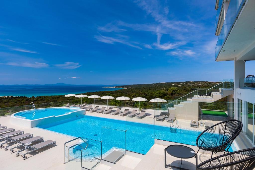 Bazén v ubytování Hotel In Excelsis nebo v jeho okolí