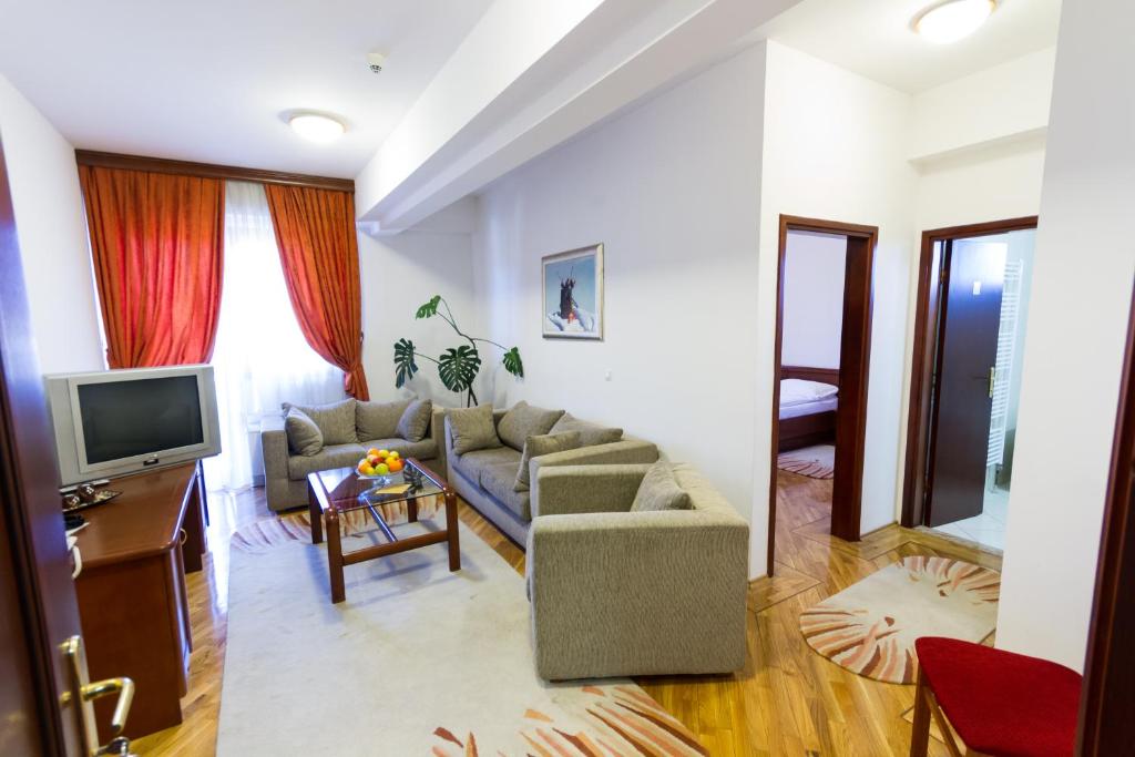 TV a/nebo společenská místnost v ubytování Hotel M3