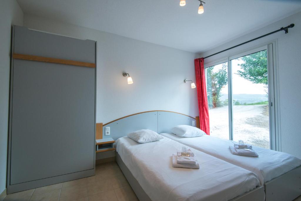 Postel nebo postele na pokoji v ubytování Domaine de l'Espinet