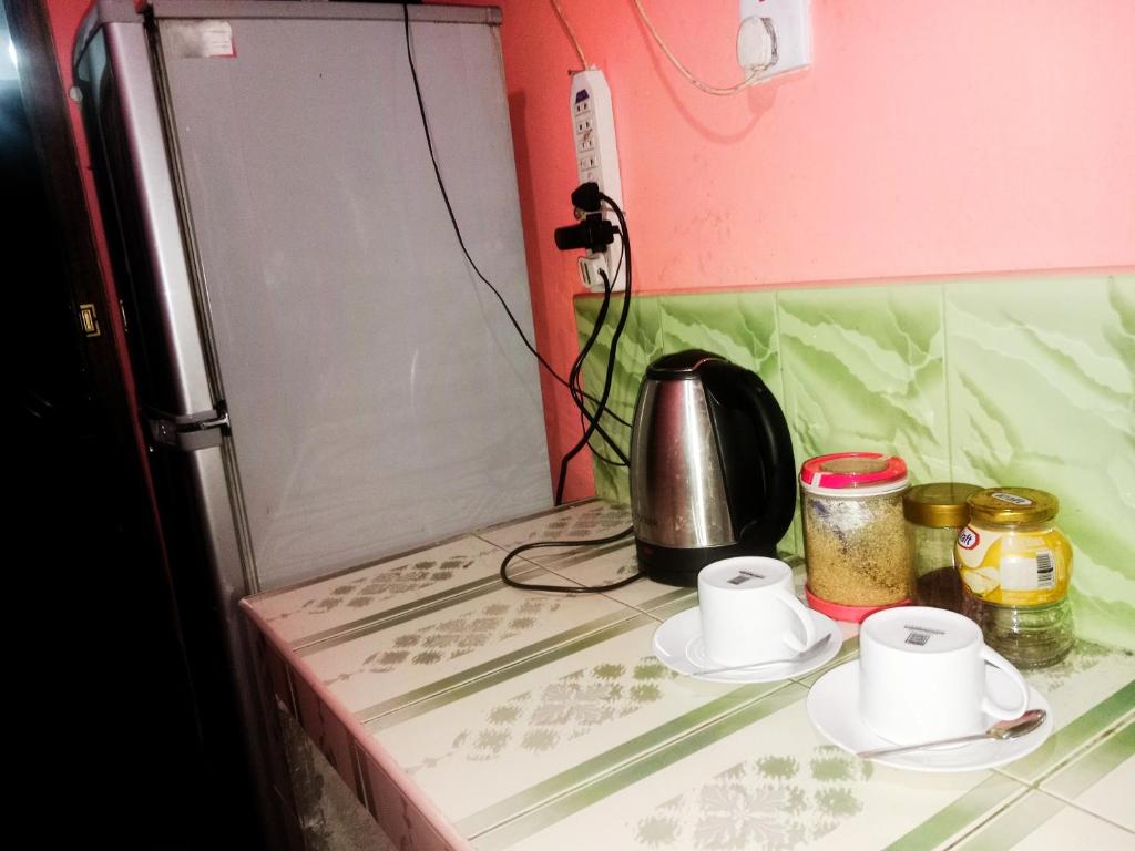Příslušenství pro přípravu čaje a kávy v ubytování Wild Grass Inn - Ella