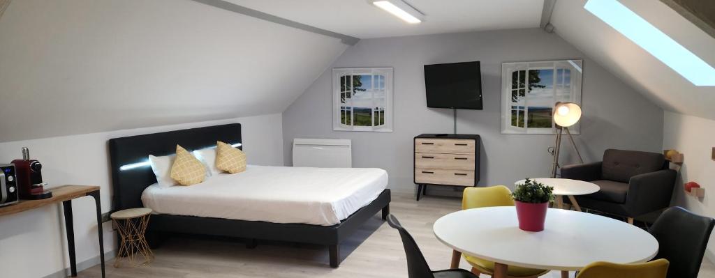 Postel nebo postele na pokoji v ubytování Break Hôtel