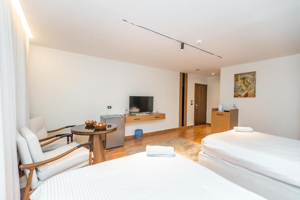 Postel nebo postele na pokoji v ubytování Superior Pyramids Inn