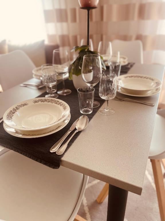 Nápoje v ubytování Alpesi Apartman Downtown