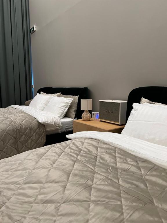 Postel nebo postele na pokoji v ubytování Ocean View Suite