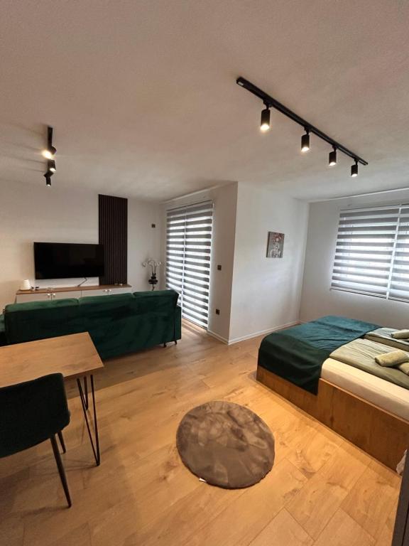 Postel nebo postele na pokoji v ubytování Apartmani Stars