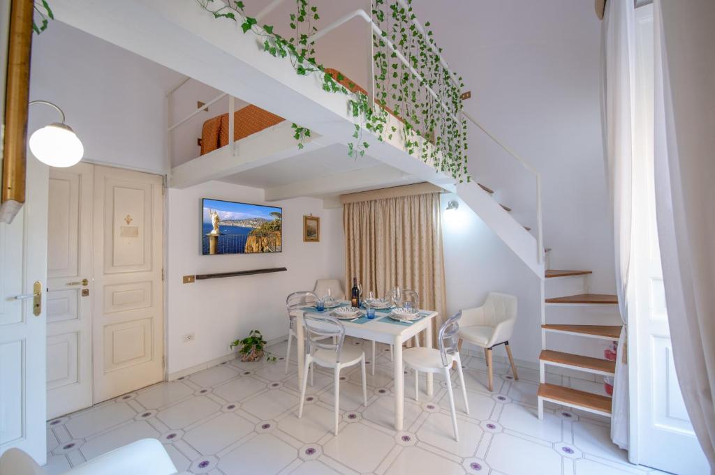 Ruang duduk di AntonelloApartments - La casa del pozzo