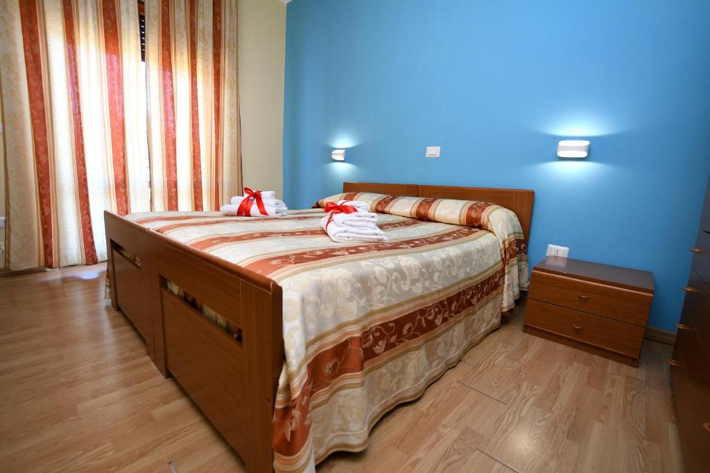 Postel nebo postele na pokoji v ubytování International Resort