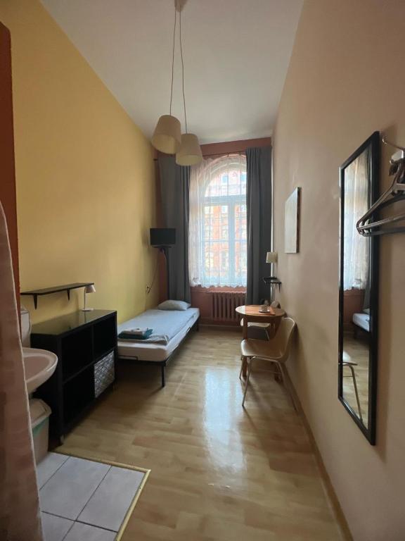 Posteľ alebo postele v izbe v ubytovaní U Szermierzy