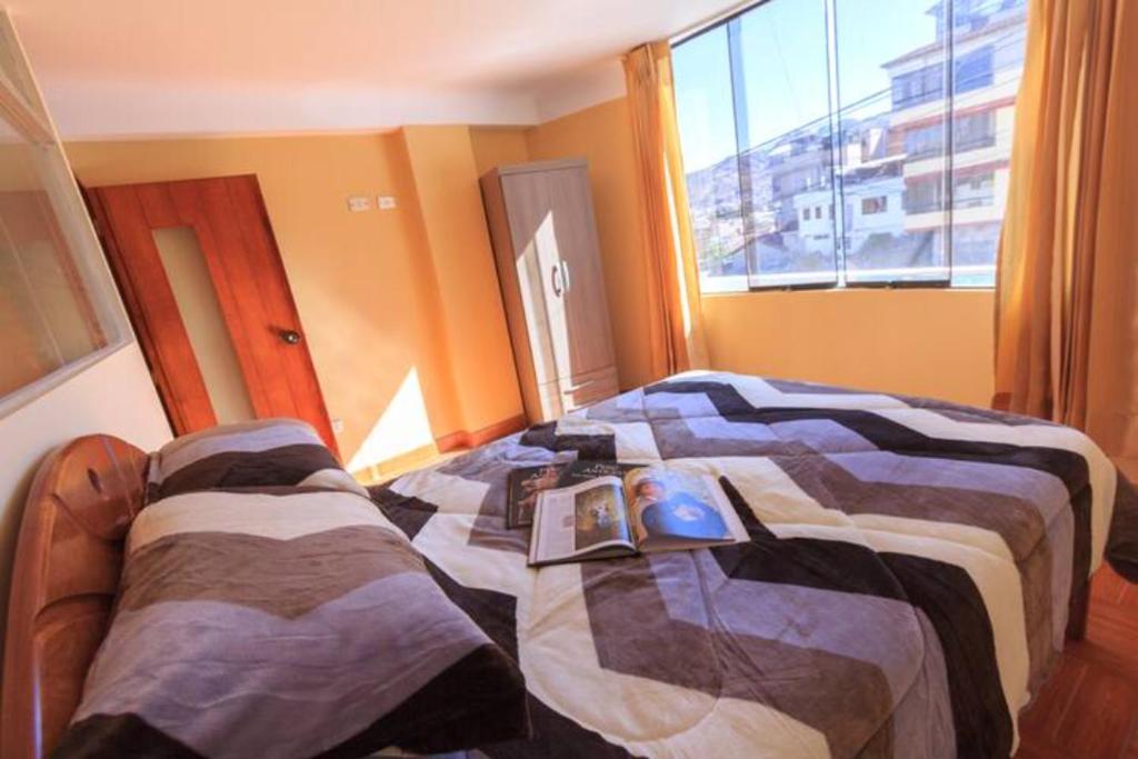 Postel nebo postele na pokoji v ubytování La Casa de Momo