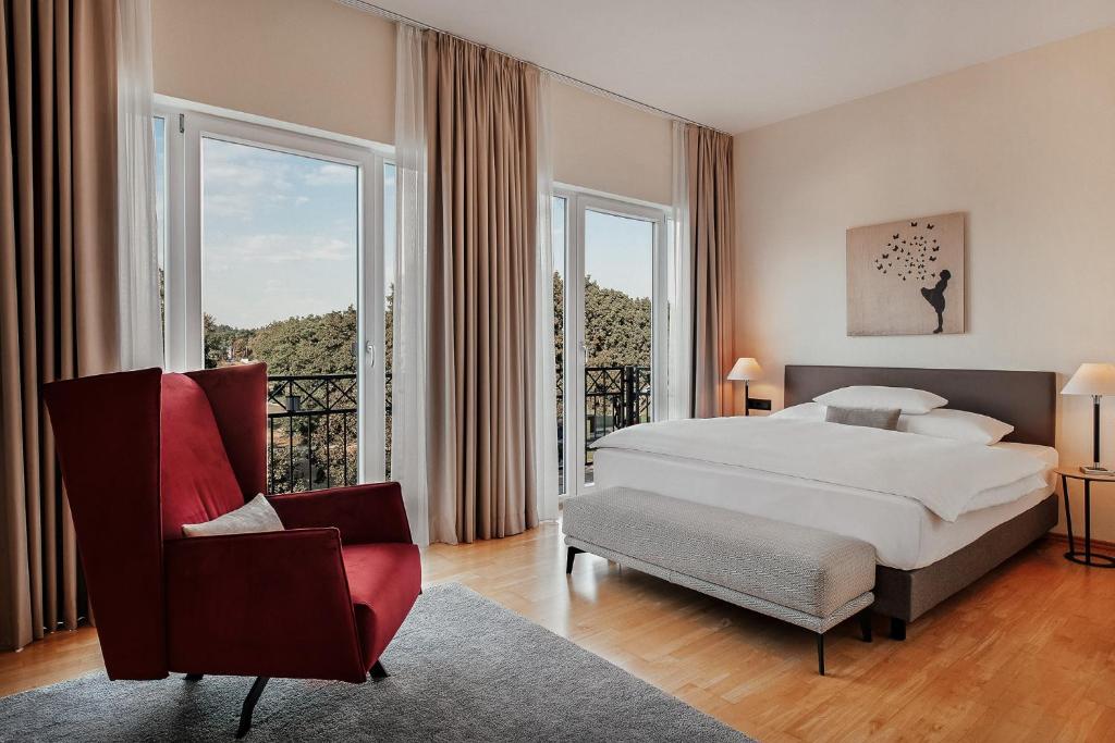 Postel nebo postele na pokoji v ubytování Hotel Villa Medici