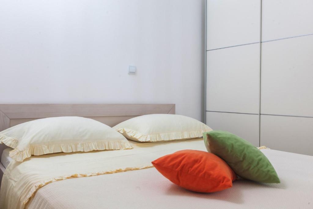 Postel nebo postele na pokoji v ubytování Apartments Filipeti