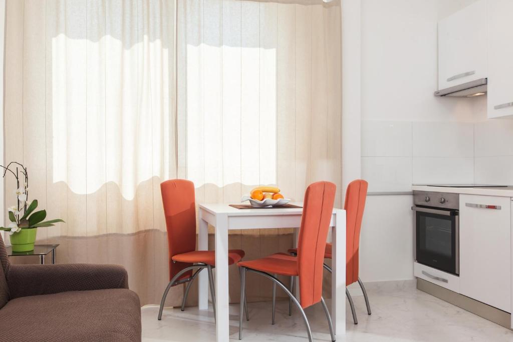 Kuchyň nebo kuchyňský kout v ubytování Apartments Filipeti