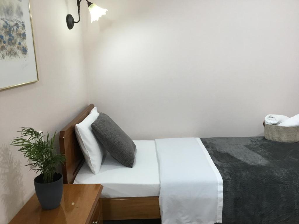 Postel nebo postele na pokoji v ubytování Hotel Triantafyllou