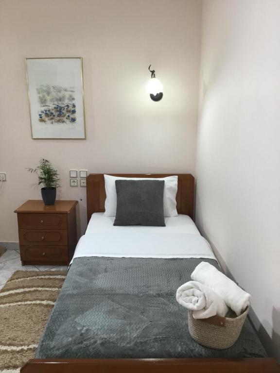 Postel nebo postele na pokoji v ubytování Hotel Triantafyllou