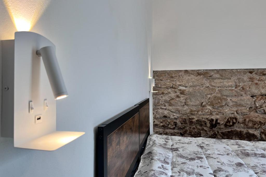 Letto o letti in una camera di Le dimore di Traiano