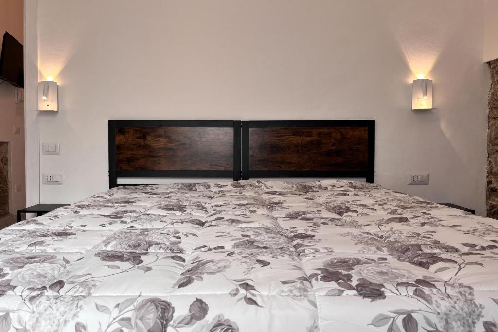 Letto o letti in una camera di Le dimore di Traiano