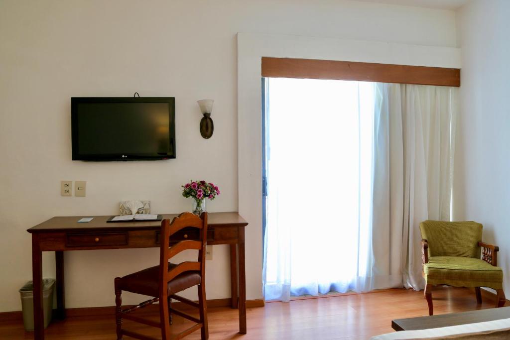TV a/nebo společenská místnost v ubytování Hotel de Mendoza