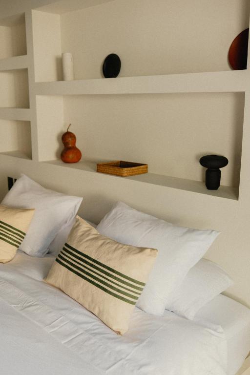 Postel nebo postele na pokoji v ubytování Ixum, Casa Hotel Boutique
