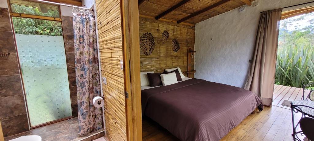 Postel nebo postele na pokoji v ubytování Exclusivo Cocora con Jacuzzi Salento Quindio