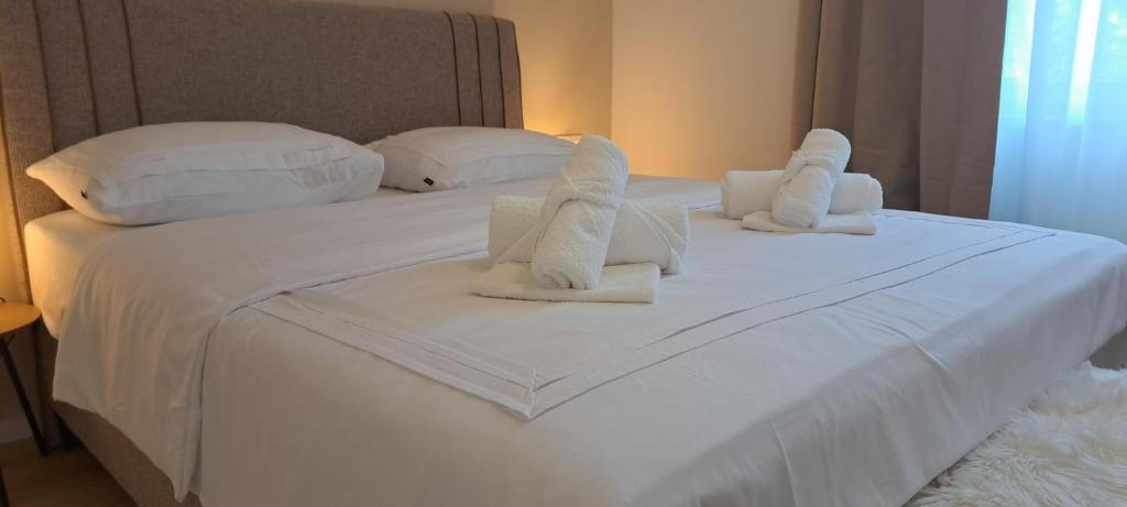 Postel nebo postele na pokoji v ubytování A&Z deluxe i studio apartment