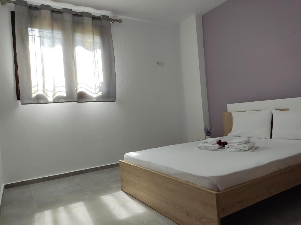 Posteľ alebo postele v izbe v ubytovaní Milias Apartment's