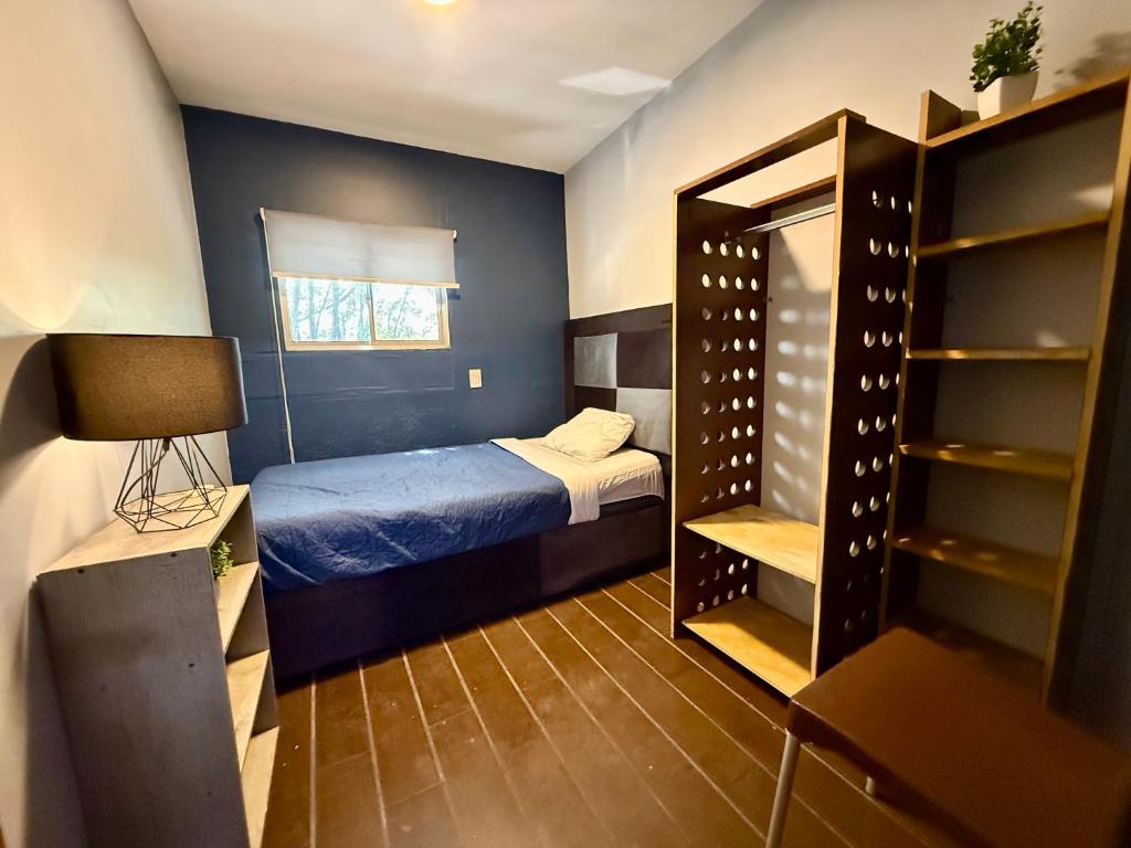 Letto o letti in una camera di RHM Spaces - SantaMaria
