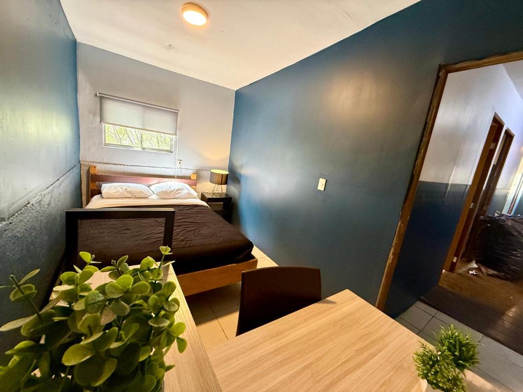 Letto o letti in una camera di RHM Spaces - SantaMaria