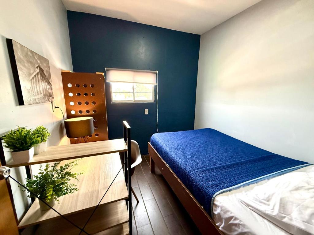 Letto o letti in una camera di RHM Spaces - SantaMaria