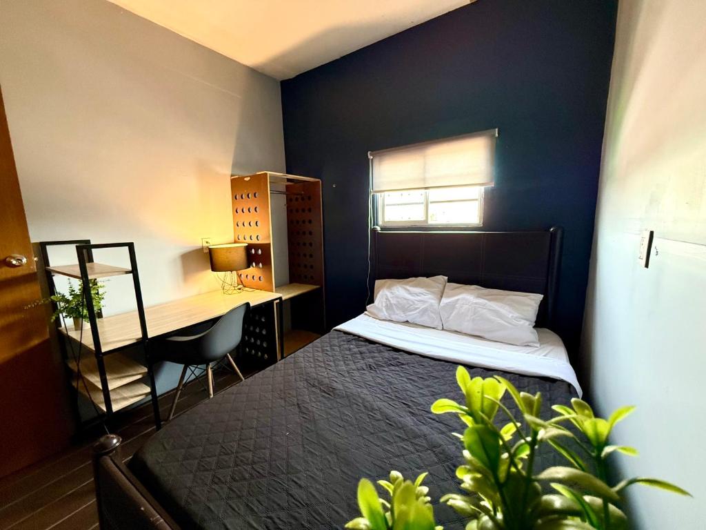Letto o letti in una camera di RHM Spaces - SantaMaria