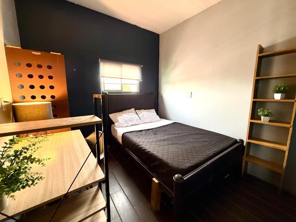 Letto o letti in una camera di RHM Spaces - SantaMaria