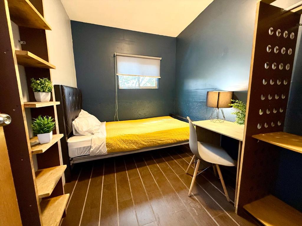 Letto o letti in una camera di RHM Spaces - SantaMaria