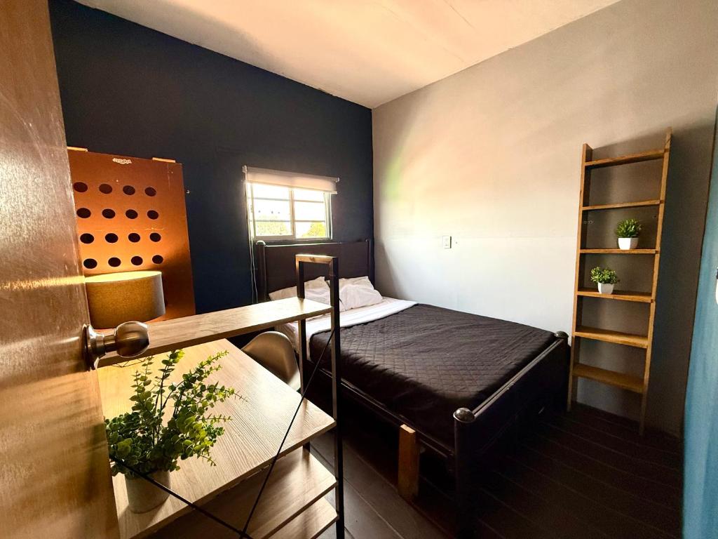 Letto o letti in una camera di RHM Spaces - SantaMaria