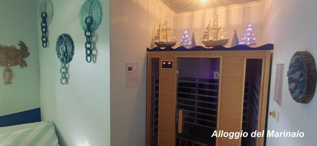 Posteľ alebo postele v izbe v ubytovaní Alloggi Turistici con Piscina Palestra Jacuzzi Sauna - All Inclusive