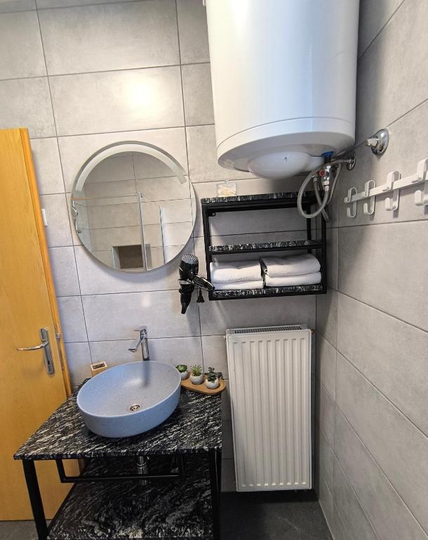 Kuchyň nebo kuchyňský kout v ubytování Apartment Stella