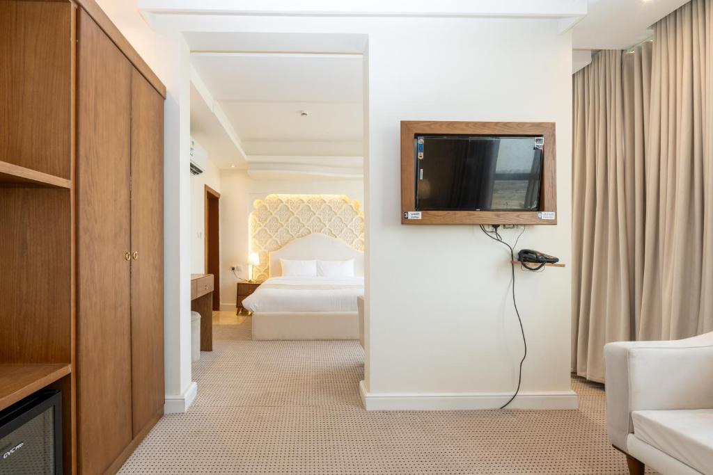 Postel nebo postele na pokoji v ubytování فندق أفين- Avene Hotel