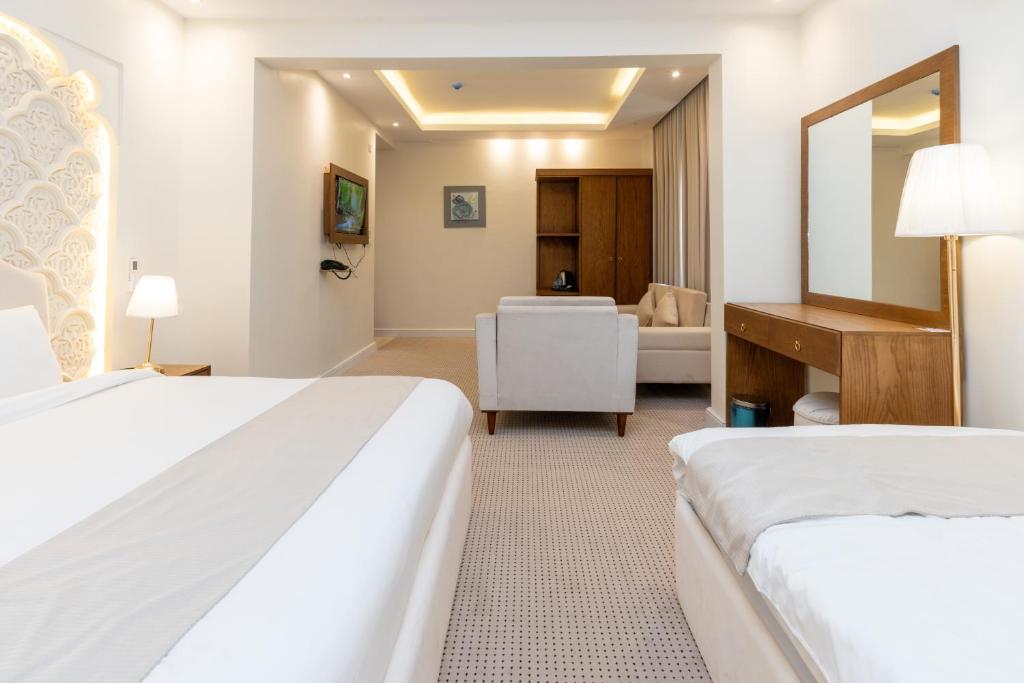 Postel nebo postele na pokoji v ubytování فندق أفين- Avene Hotel