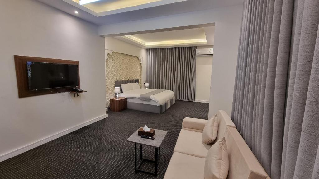 Postel nebo postele na pokoji v ubytování فندق أفين- Avene Hotel