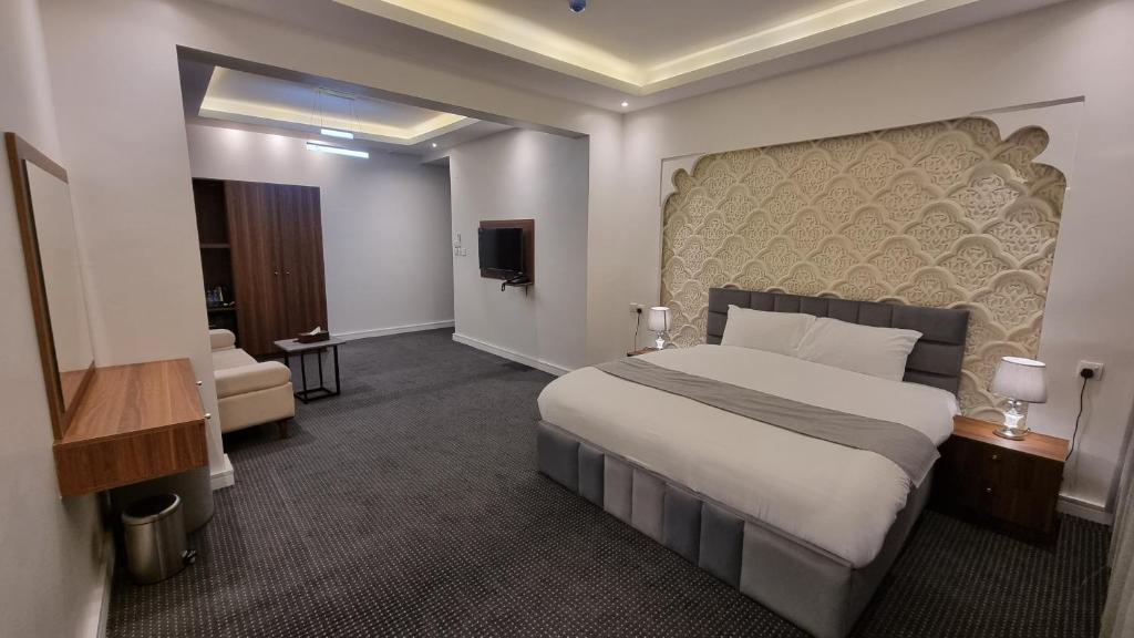 Postel nebo postele na pokoji v ubytování فندق أفين- Avene Hotel