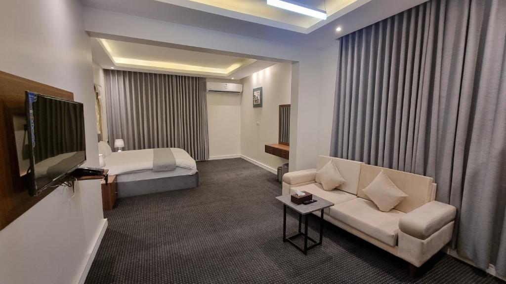 Postel nebo postele na pokoji v ubytování فندق أفين- Avene Hotel