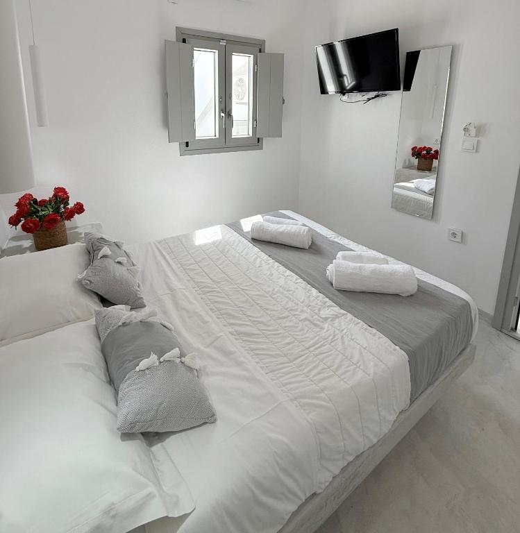 Postel nebo postele na pokoji v ubytování Sepal Residence